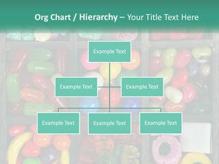 A Wooden Box Filled With Lots Of Candy PowerPoint Template