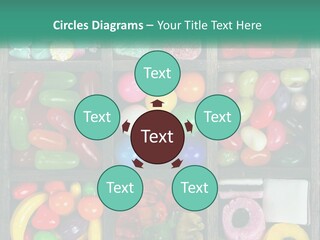 A Wooden Box Filled With Lots Of Candy PowerPoint Template