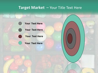 A Wooden Box Filled With Lots Of Candy PowerPoint Template