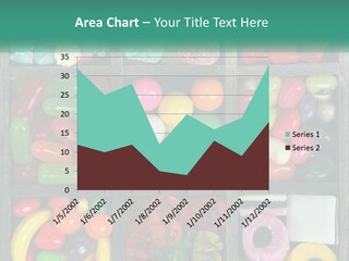 A Wooden Box Filled With Lots Of Candy PowerPoint Template