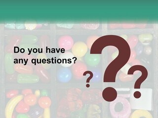 A Wooden Box Filled With Lots Of Candy PowerPoint Template