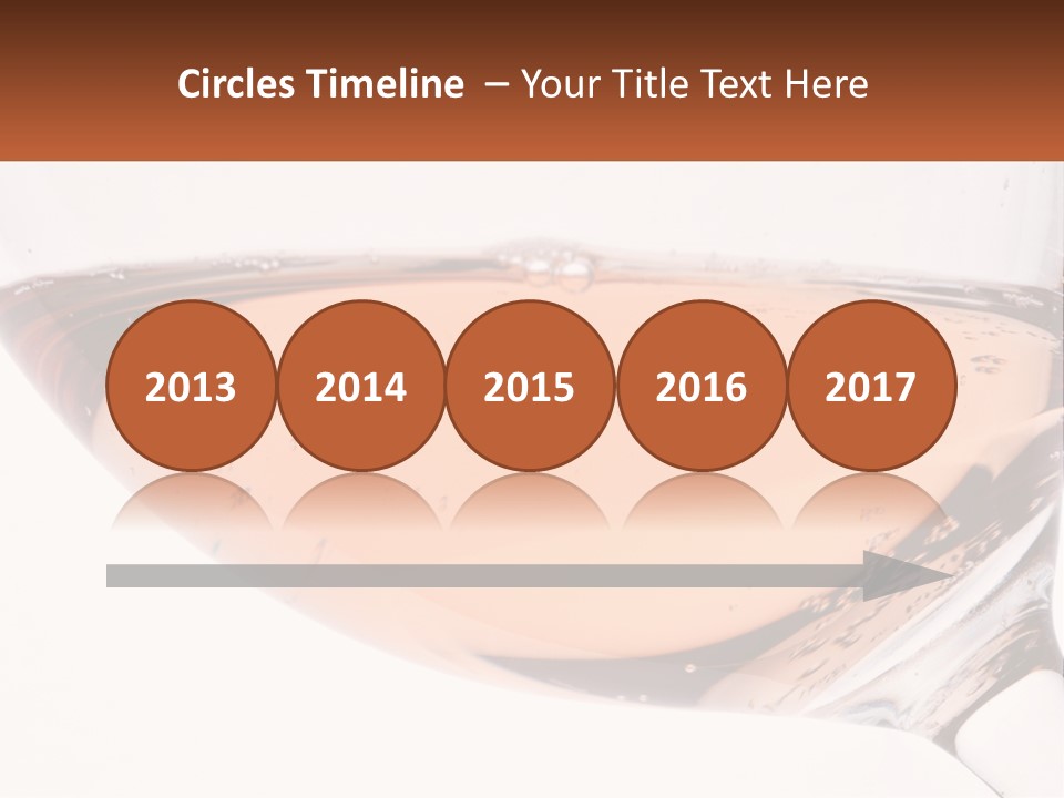 A Glass Of White Wine With A Brown Label On It PowerPoint Template