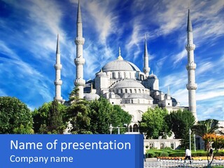 A Large White Building With A Blue Sky In The Background PowerPoint Template