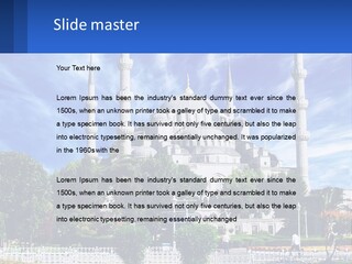 A Large White Building With A Blue Sky In The Background PowerPoint Template