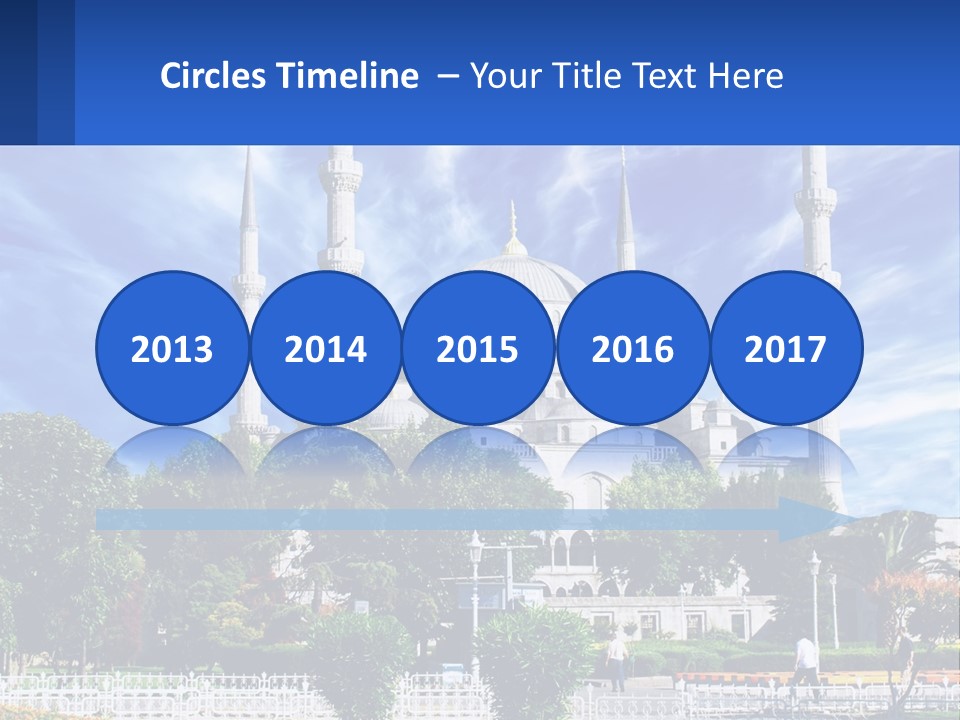 A Large White Building With A Blue Sky In The Background PowerPoint Template