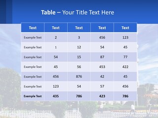 A Large White Building With A Blue Sky In The Background PowerPoint Template