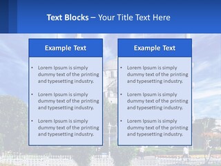 A Large White Building With A Blue Sky In The Background PowerPoint Template