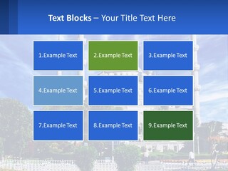 A Large White Building With A Blue Sky In The Background PowerPoint Template