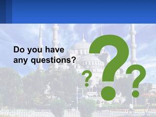 A Large White Building With A Blue Sky In The Background PowerPoint Template