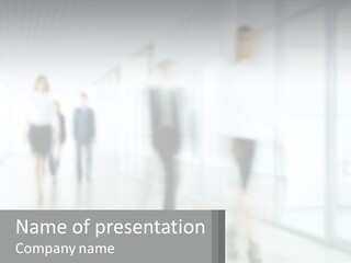 A Group Of People Walking Down A Hallway PowerPoint Template