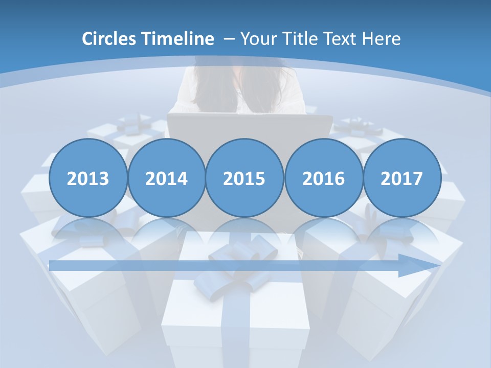 A Woman Sitting In Front Of A Laptop Surrounded By Presents PowerPoint Template