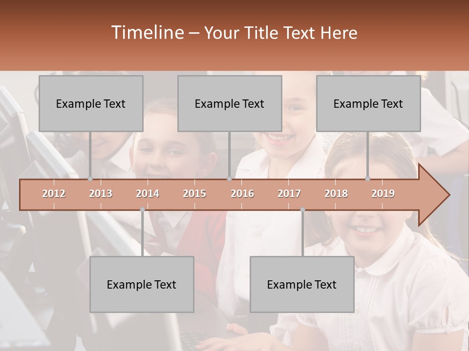 A Group Of Children Sitting In Front Of A Computer PowerPoint Template