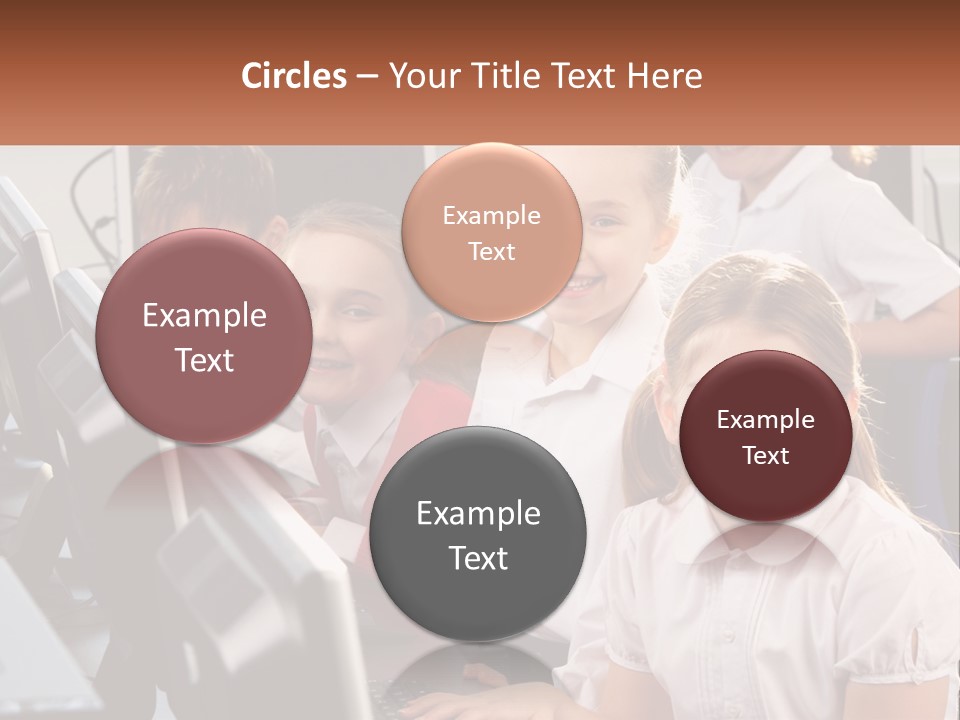 A Group Of Children Sitting In Front Of A Computer PowerPoint Template