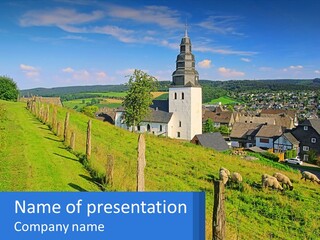 A Church On A Hill With Sheep Grazing In The Foreground PowerPoint Template