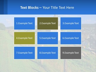 A Church On A Hill With Sheep Grazing In The Foreground PowerPoint Template