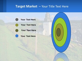 A Church On A Hill With Sheep Grazing In The Foreground PowerPoint Template