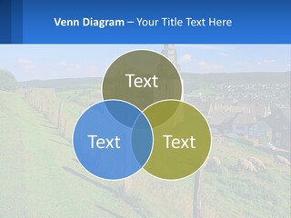 A Church On A Hill With Sheep Grazing In The Foreground PowerPoint Template