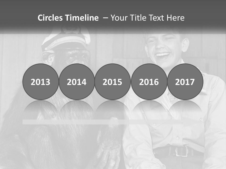 A Man Sitting Next To A Monkey With A Hat On PowerPoint Template