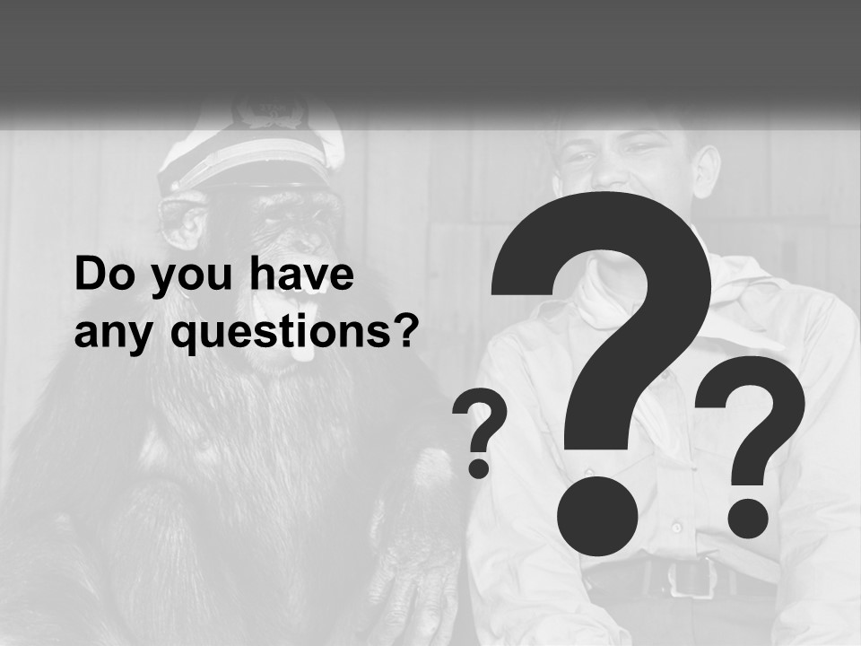 A Man Sitting Next To A Monkey With A Hat On PowerPoint Template