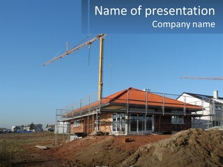 A House Under Construction With A Crane In The Background PowerPoint Template