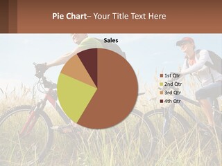 A Couple Of People Riding Bikes Through A Field PowerPoint Template