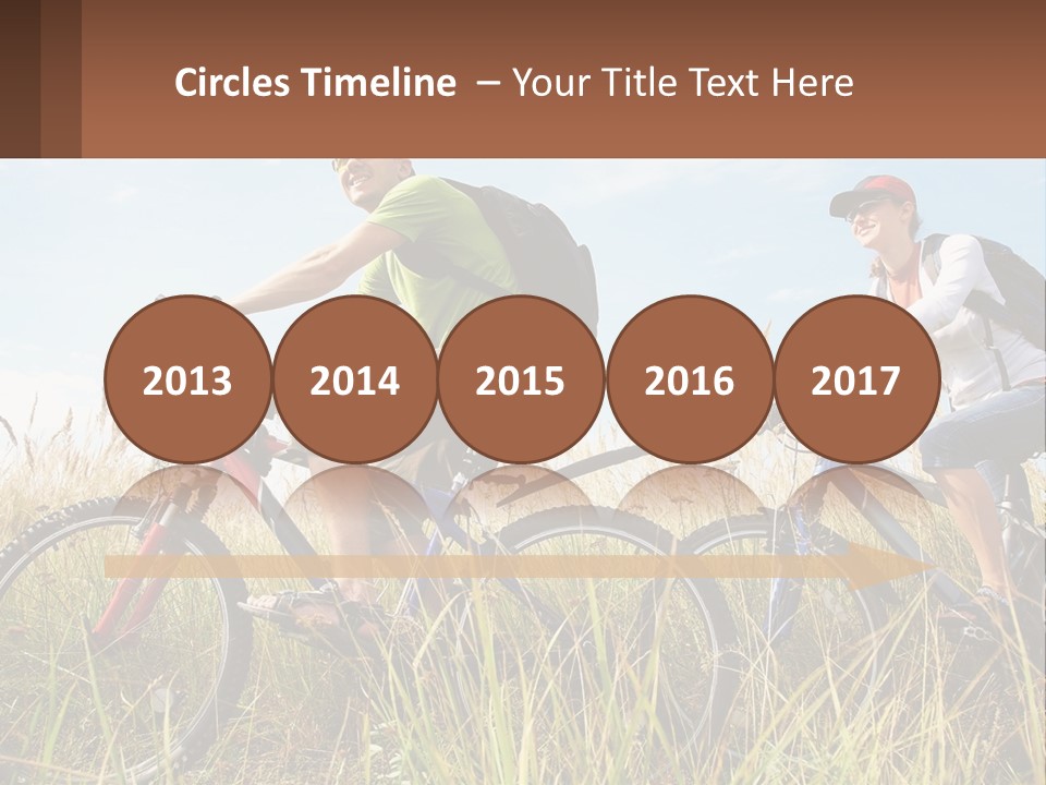 A Couple Of People Riding Bikes Through A Field PowerPoint Template