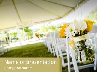 A Mason Jar Filled With Yellow And White Flowers PowerPoint Template