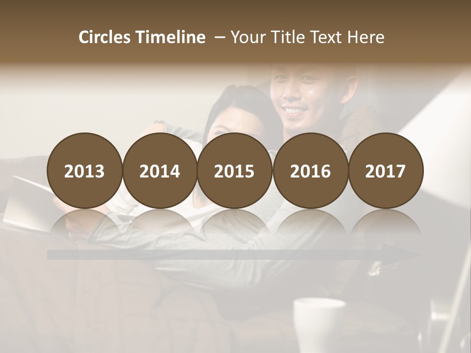 A Man And A Woman Sitting On A Couch PowerPoint Template