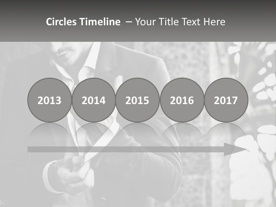 A Man In A Suit Is Holding A Pair Of Scissors PowerPoint Template