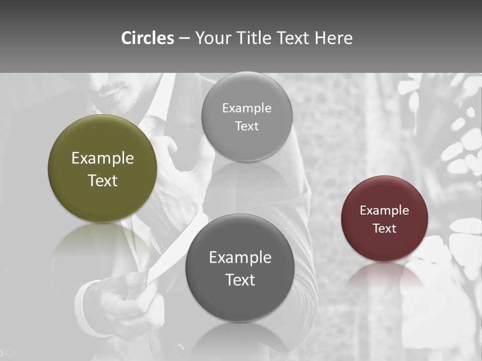 A Man In A Suit Is Holding A Pair Of Scissors PowerPoint Template