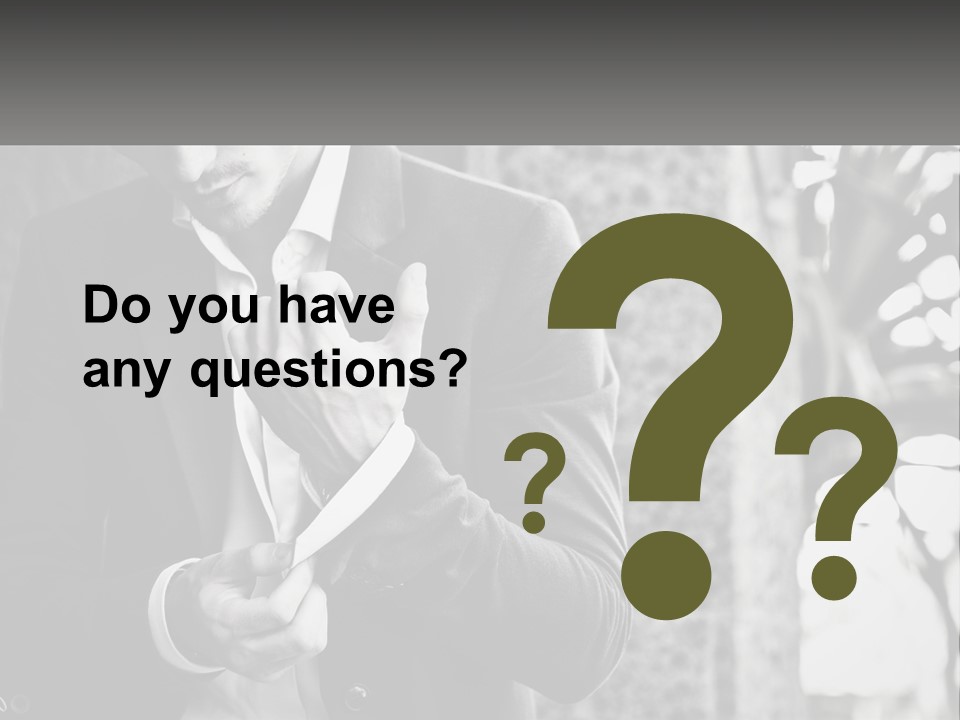 A Man In A Suit Is Holding A Pair Of Scissors PowerPoint Template