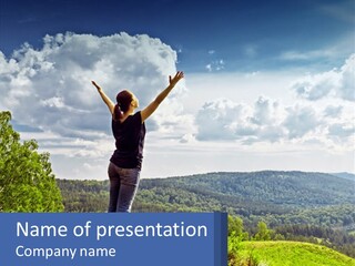 A Woman Standing On Top Of A Hill With Her Arms Outstretched PowerPoint Template