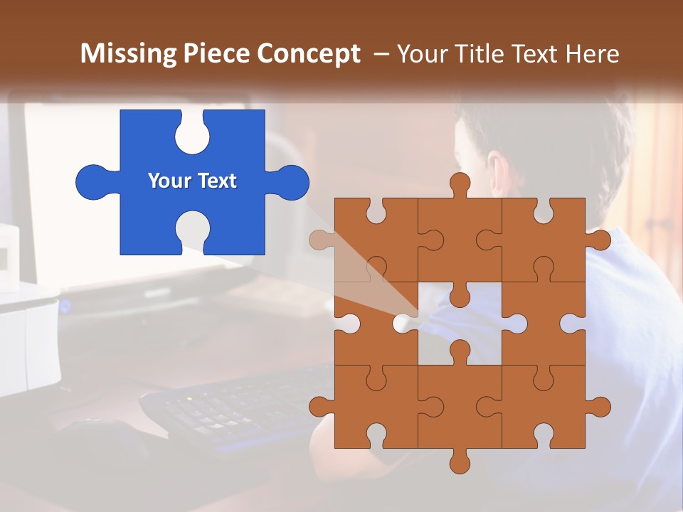 A Young Boy Sitting At A Desk With A Computer PowerPoint Template