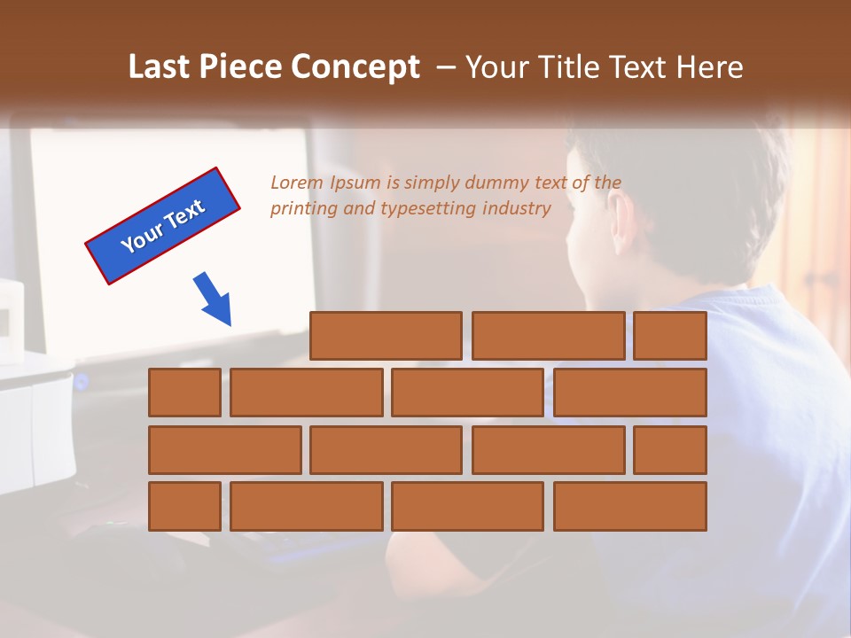 A Young Boy Sitting At A Desk With A Computer PowerPoint Template
