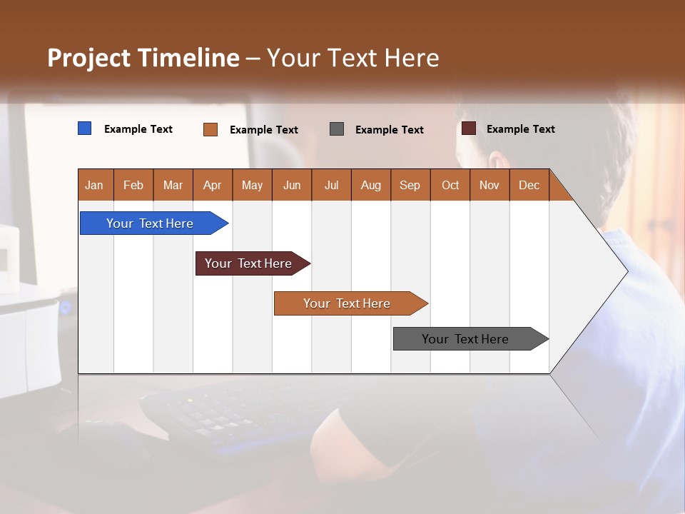 A Young Boy Sitting At A Desk With A Computer PowerPoint Template