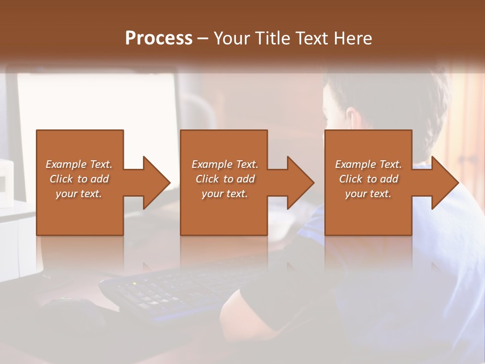 A Young Boy Sitting At A Desk With A Computer PowerPoint Template