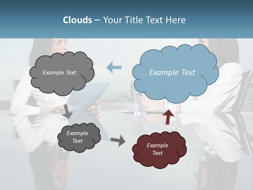 Two Women Sitting At A Table With Papers In Front Of Them PowerPoint Template
