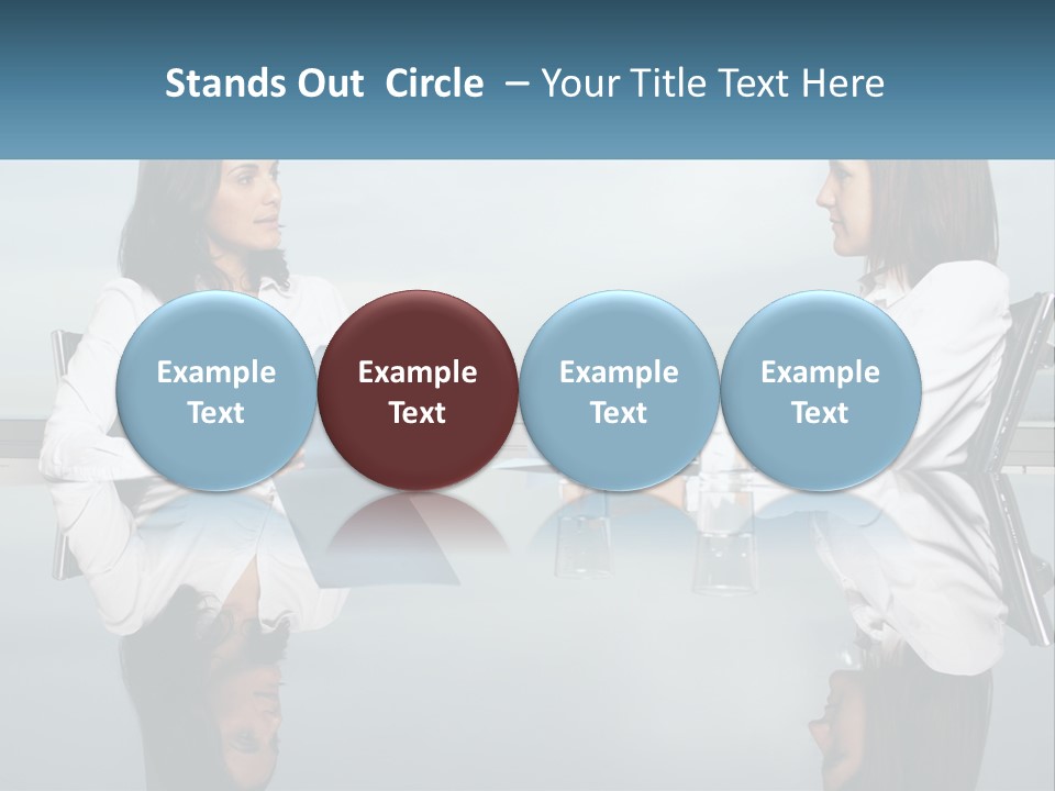 Two Women Sitting At A Table With Papers In Front Of Them PowerPoint Template