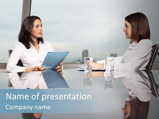 Two Women Sitting At A Table Talking To Each Other PowerPoint Template