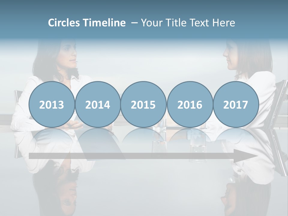 Two Women Sitting At A Table Talking To Each Other PowerPoint Template