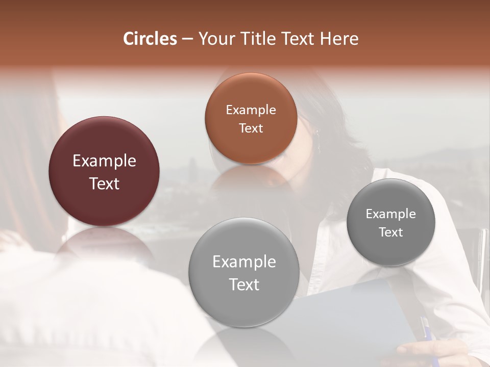 A Woman Sitting At A Desk Talking To Another Woman PowerPoint Template