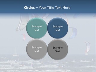 A Group Of Kites Being Flown Over The Ocean PowerPoint Template
