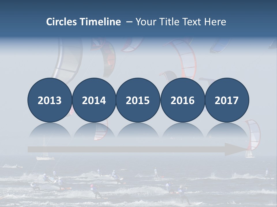 A Group Of Kites Being Flown Over The Ocean PowerPoint Template