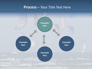 A Group Of Kites Being Flown Over The Ocean PowerPoint Template