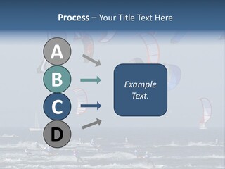A Group Of Kites Being Flown Over The Ocean PowerPoint Template