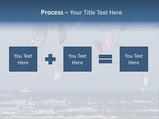 A Group Of Kites Being Flown Over The Ocean PowerPoint Template