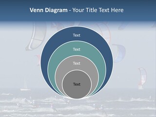 A Group Of Kites Being Flown Over The Ocean PowerPoint Template