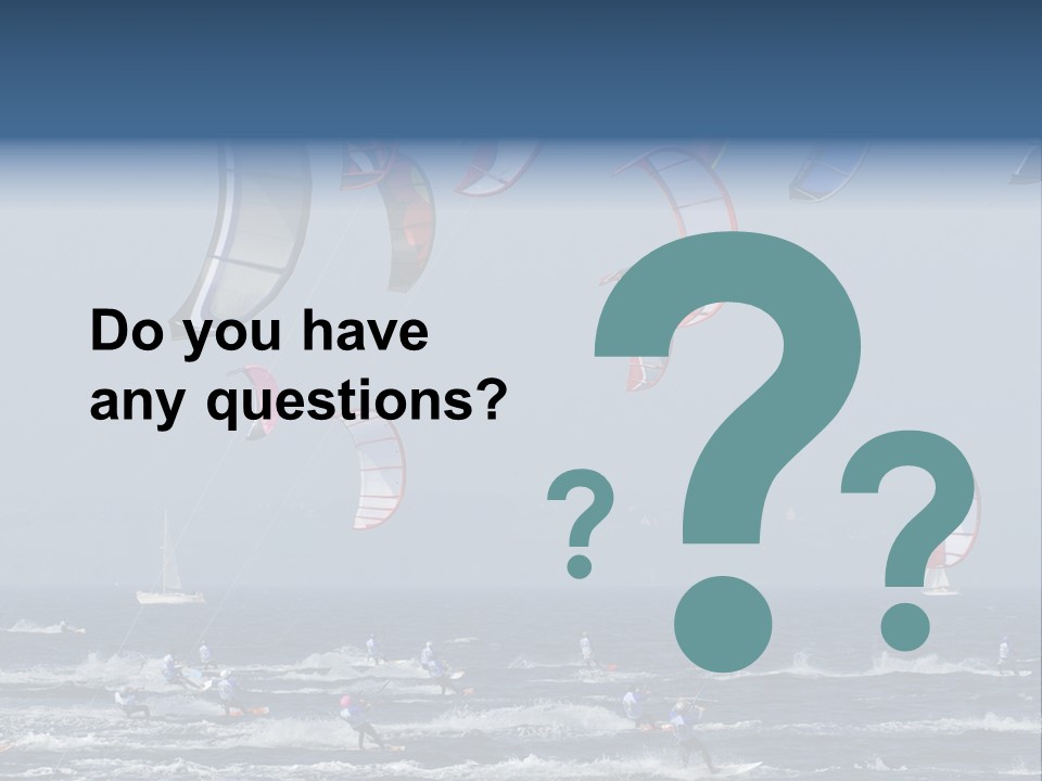 A Group Of Kites Being Flown Over The Ocean PowerPoint Template