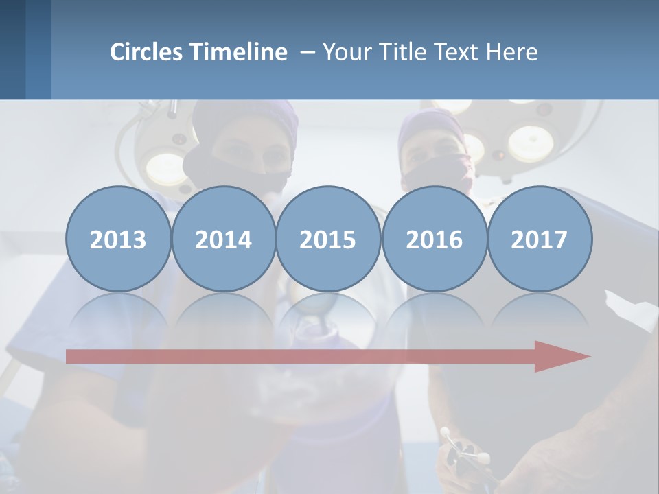 A Couple Of People In Scrubs Standing In A Room PowerPoint Template