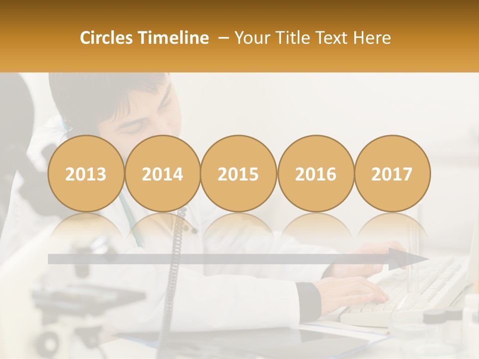 A Man In A Lab Coat Using A Laptop Computer PowerPoint Template